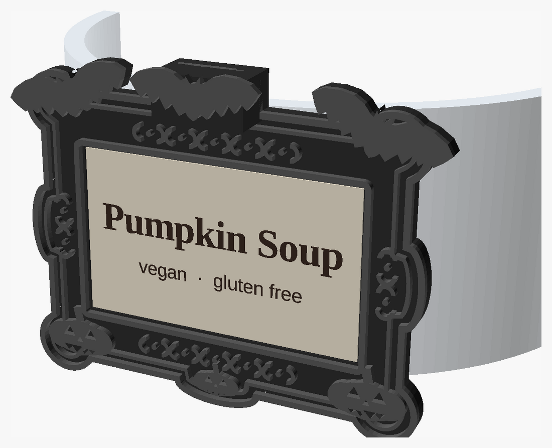 Frame hanging on the outside of a bowl, label facing out