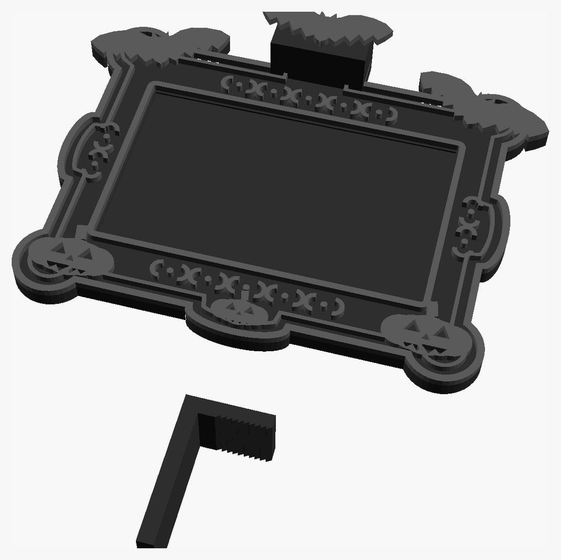 Both parts laid out for printing: the frame face-up with the keystone rising from its top edge, the clip on its side